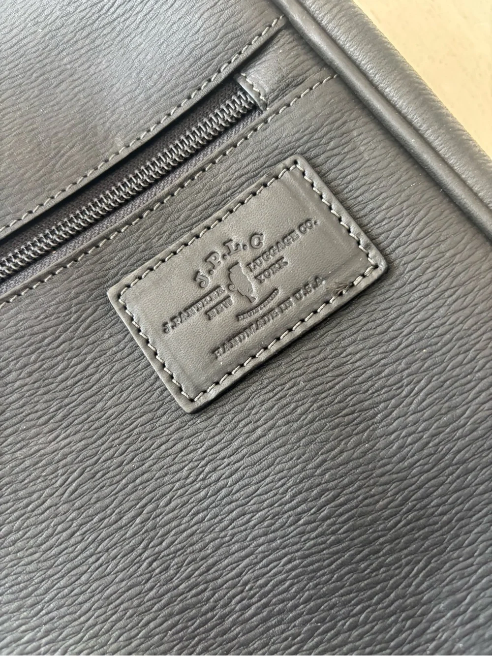 Courier Ruc Case in black grain leather